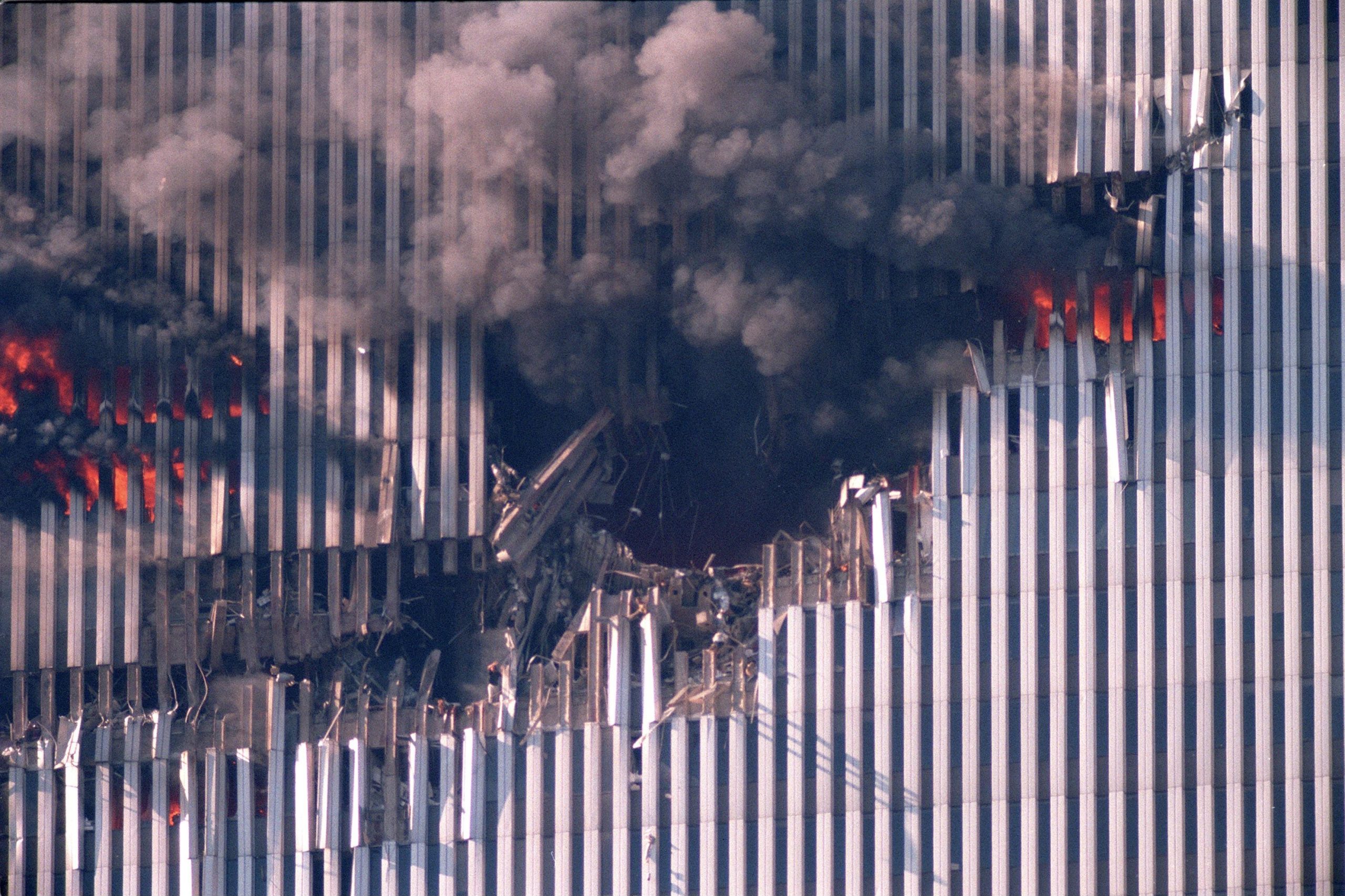 The last photo taken of Edna Cintron, waving for help after the 9/11 terrorist attacks.